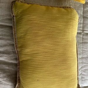 Set of two yellow rectangular throw pillows